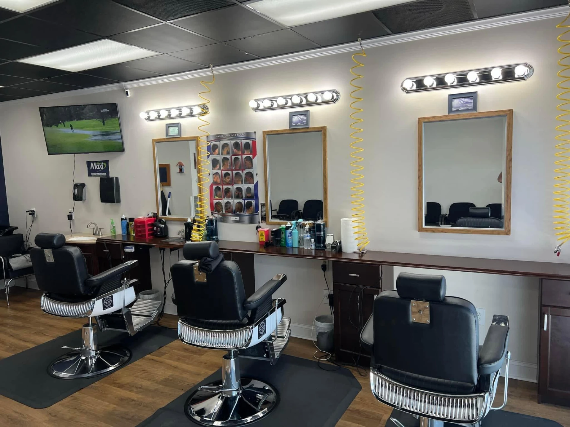 Barber chairs, mirrors and stations inside The Final Touch Hair Studio in Kannapolis